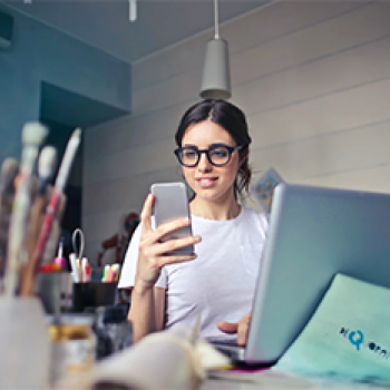 Enjoying an event on a mobile device and laptop computer