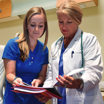 Two nurses talking